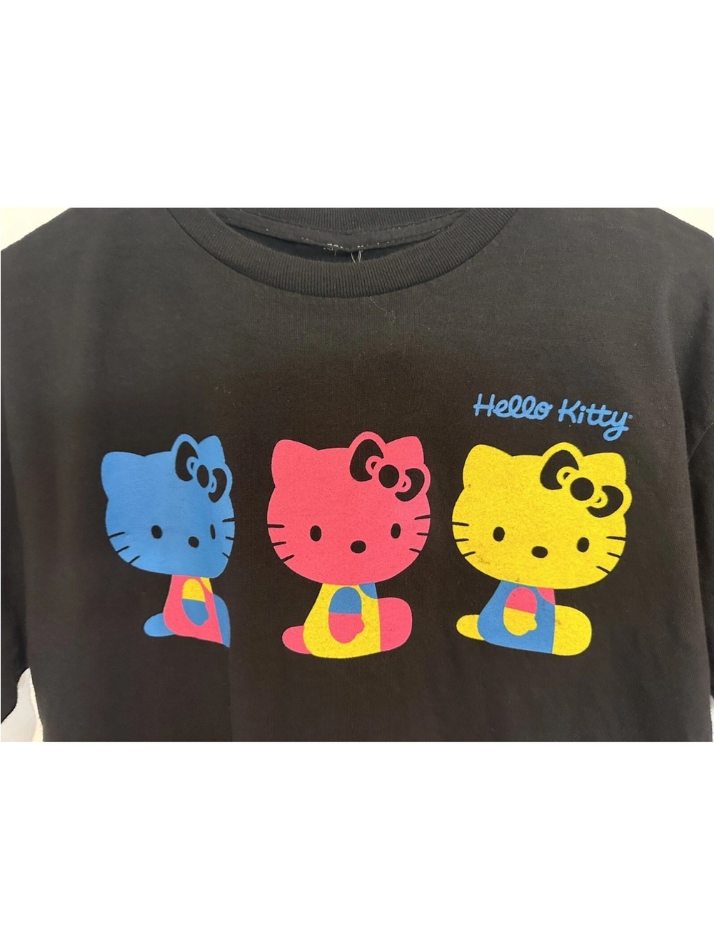 Hello Kitty Black Tee with Blue, Pink & Yellow Kitty Trio